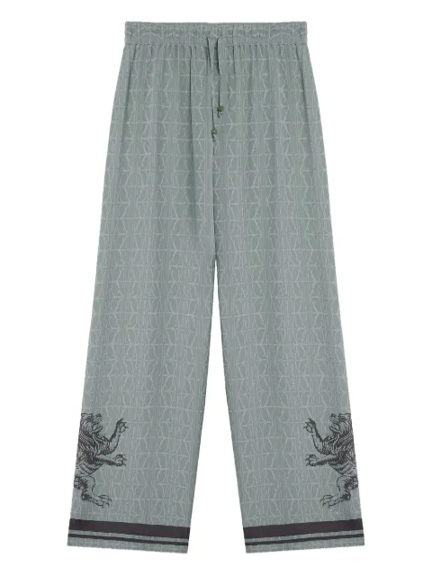 Domaine Des Artistes lion-embellished geometric-print pants Blue DDAP02BL00