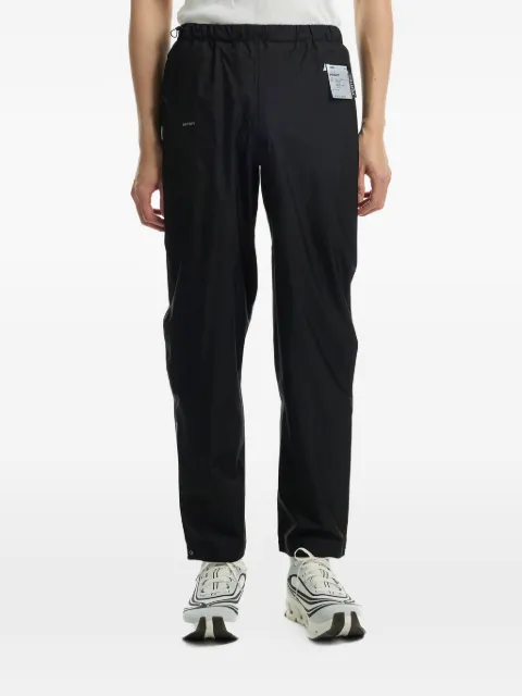 Satisfy elasticated-waistband logo-patch trousers Black 12032BKSA