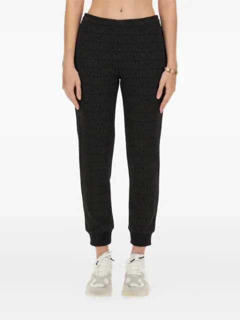 Moschino monogram-print track pants Black 030477291555