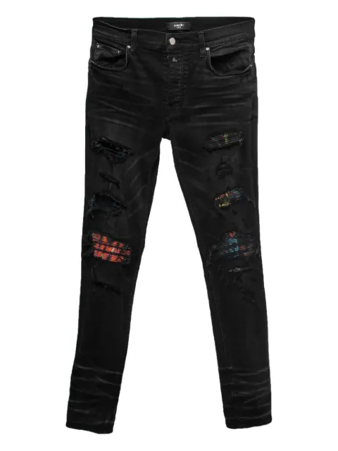 AMIRI distressed-effect patchwork-detail jeans Black 732979