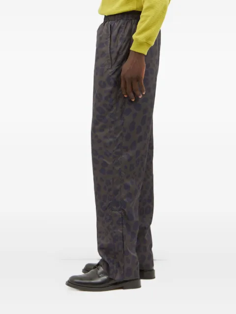 Metalwood Studio animal-print zip-cuff trousers Black MWS240801BLK