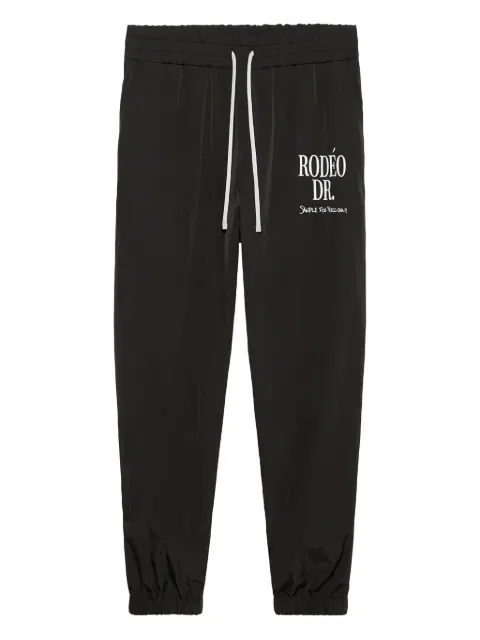 1989 STUDIO logo-print track pants Black MFW24506RODEONY