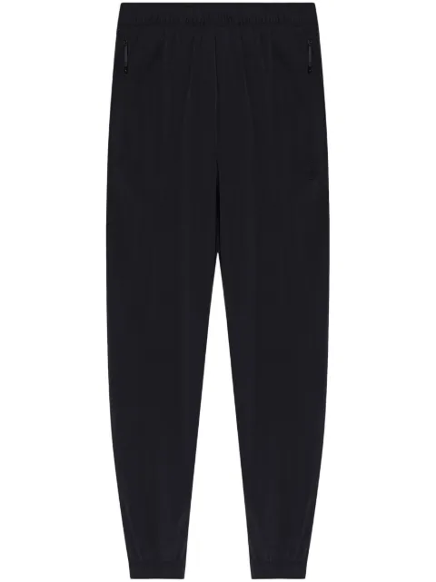 Moncler technical zip-pocket trousers Black K10912A0002359865