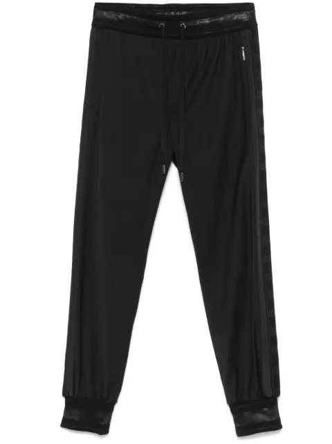 Dolce & Gabbana pinstriped tapered trousers Black GVWNHTGG810