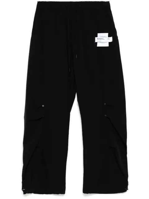 Musium Div. logo-patch trousers Black MMUPTM00733X