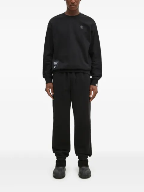 This Is Never That elasticated-ankle track pants Black TN243TPAWP05