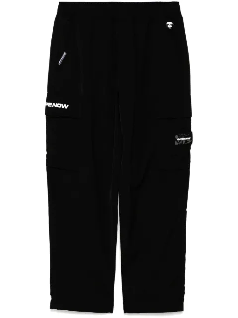 AAPE BY *A BATHING APE® moonface-logo cargo trousers Black APTB667XXO