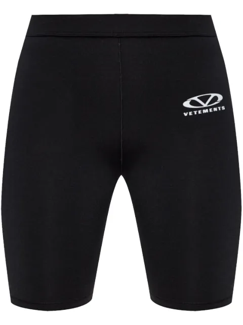 VETEMENTS logo-print track shorts Black WA66SS200B