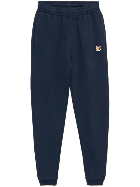 Maison Kitsuné fox-head-patched track pants Blue MW01109KM0001