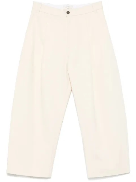 Studio Nicholson Sorte pleated curved-leg trousers Neutrals SNM1248