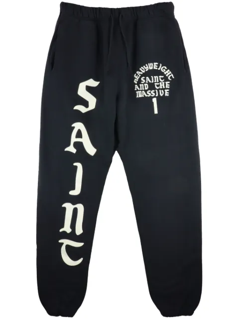 SAINT MXXXXXX It's Saint logo-print track pants Black SMYS10000049
