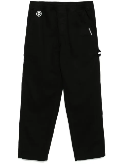 AAPE BY *A BATHING APE® Moonface logo straight-leg trousers Black APTB624XXN
