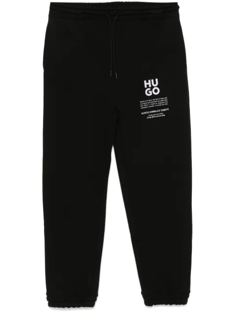 HUGO logo and slogans print track pants Black 50521273