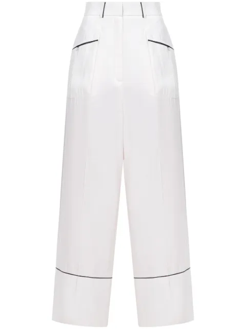 A.M.G. piped-trim trousers White TR0223