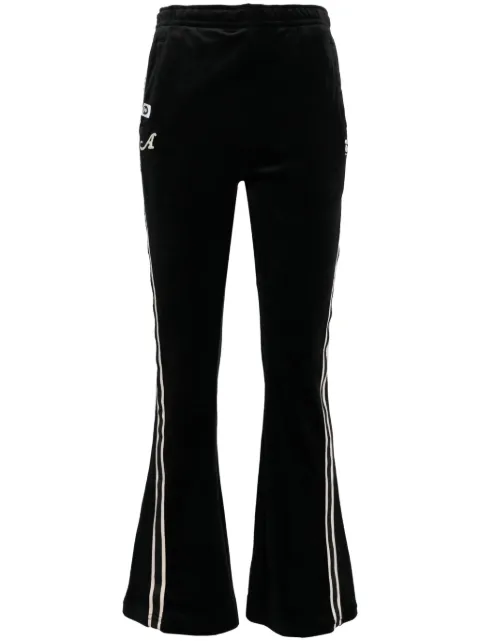 A BATHING APE® logo-patch flared trousers Black APTB653XXN