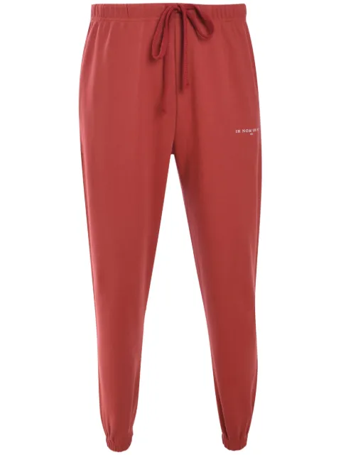 Ih Nom Uh Nit logo-print track pants Red NUW24303C39