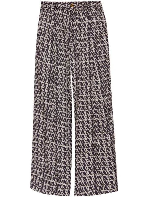 AERON Wellen monogram-print trousers Black PA249519