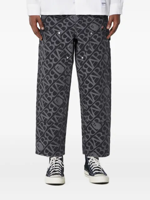 A BATHING APE® logo-pattern carpenter jeans Black 1J80150052