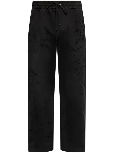 AMIRI distressed-finish track pants Black AMJYSP1023