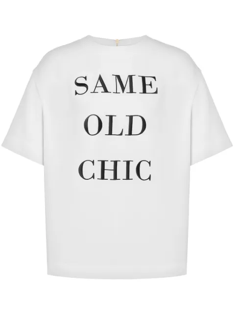 Moschino slogan-print zip-up T-shirt White J02015533