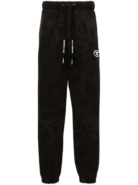 AAPE BY *A BATHING APE® graphic-print drawstring track pants Black AAPPTMA693XXM