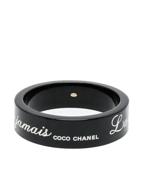 CHANEL Pre-Owned 2007s slogan-print bangle bracelet Black 1501564