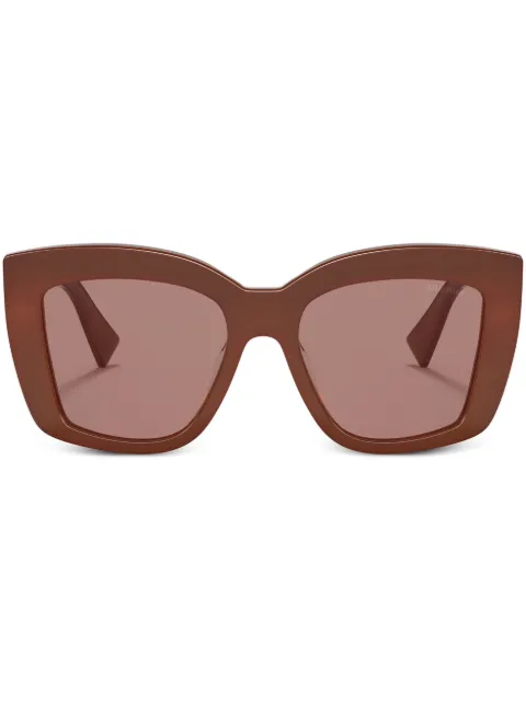 Miu Miu Eyewear logo-print sunglasses Red SMU04W07X06P