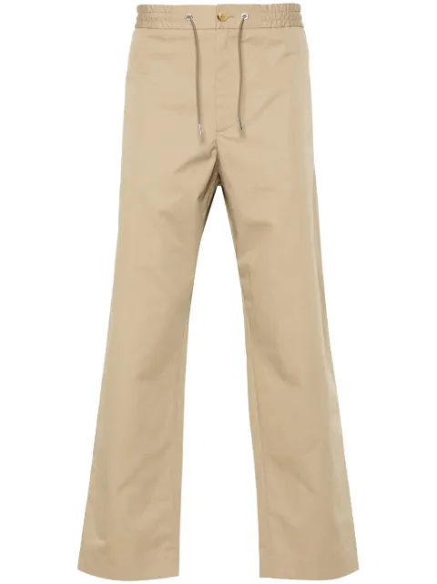 Moncler logo-appliqué tapered trousers Neutrals J10912A00037597LL