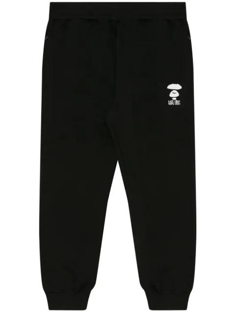 AAPE BY *A BATHING APE® Moonface embroidered track pants Black APTA691XXM