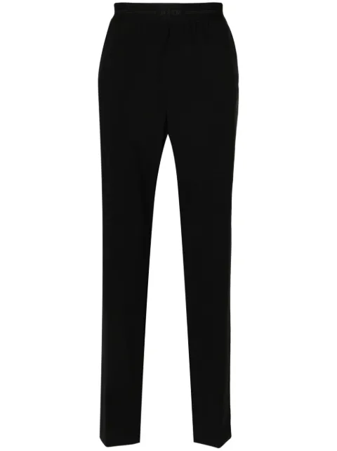 MSGM logo-waistband tapered trousers Black 3640MP1124720099