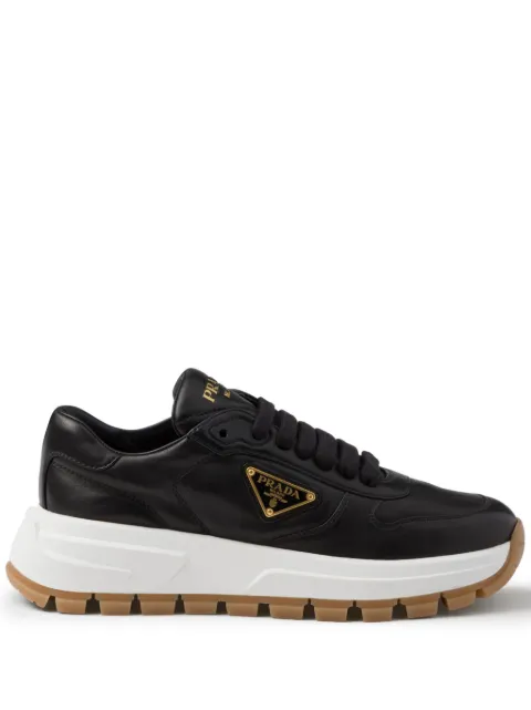 Prada triangle-logo leather sneakers Black 1E804MFB045038