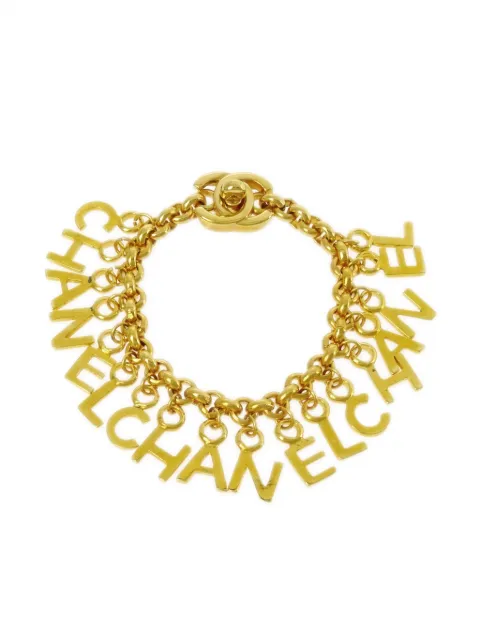 CHANEL Pre-Owned 1996 Turnlock letter charms bracelet Gold BR96P
