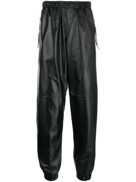Moschino cropped leather track pants Black A37030271