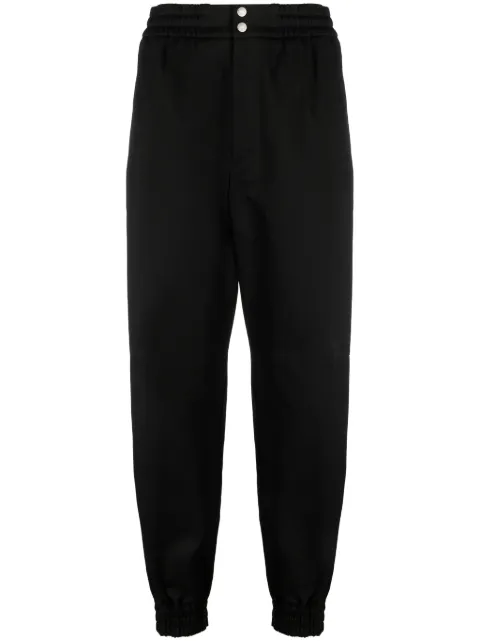 Alexander McQueen tapered-leg cotton trousers Black 774187QSAAN