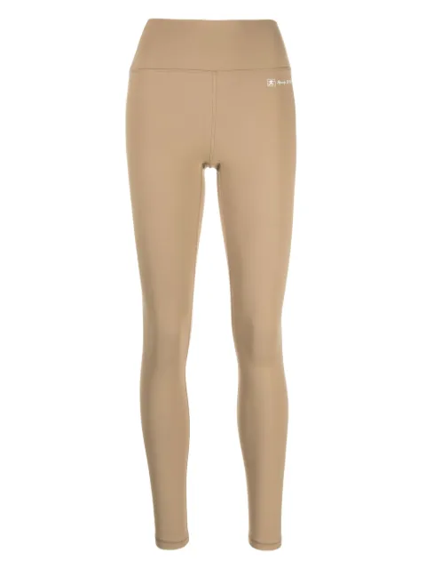 Sporty & Rich Runner Script logo-embossed leggings Brown LEAW238ER
