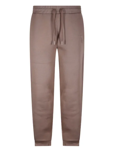 AMI Paris embossed-logo track pants Neutrals E24UTR225749
