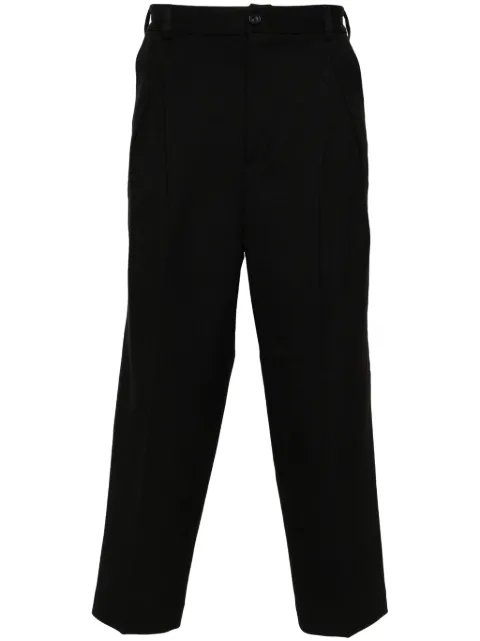 White Mountaineering button-fastening cotton tapered trousers Black WM2373403