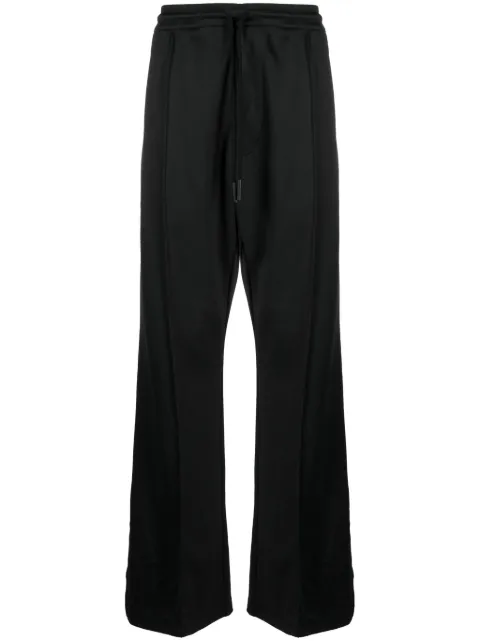COUNTY OF MILAN bandana-print track pants Black CMCJ002F23JER0011011