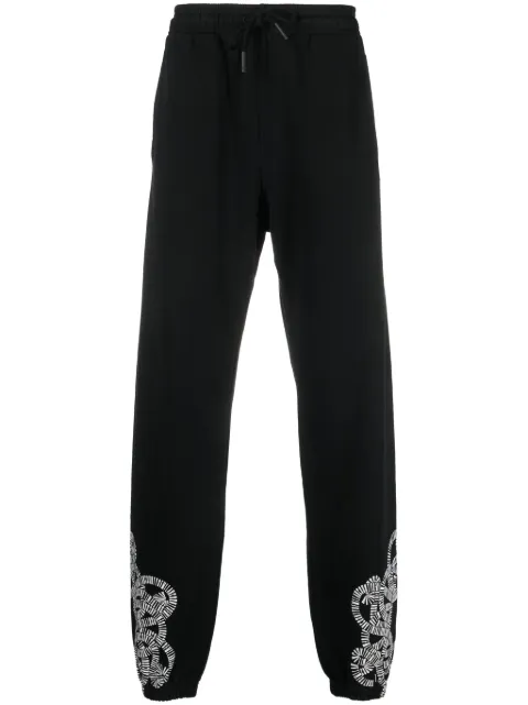 COUNTY OF MILAN logo-print organic-cotton track pants Black CMCH024C99FLE0031001