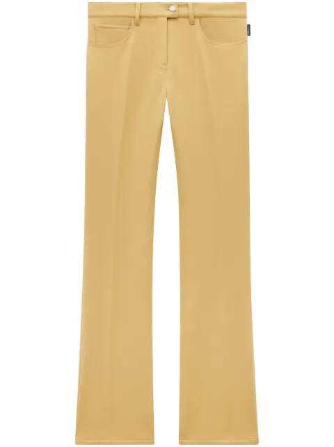 Courrèges low-rise bootcut trousers Yellow 123CPA018PL0007