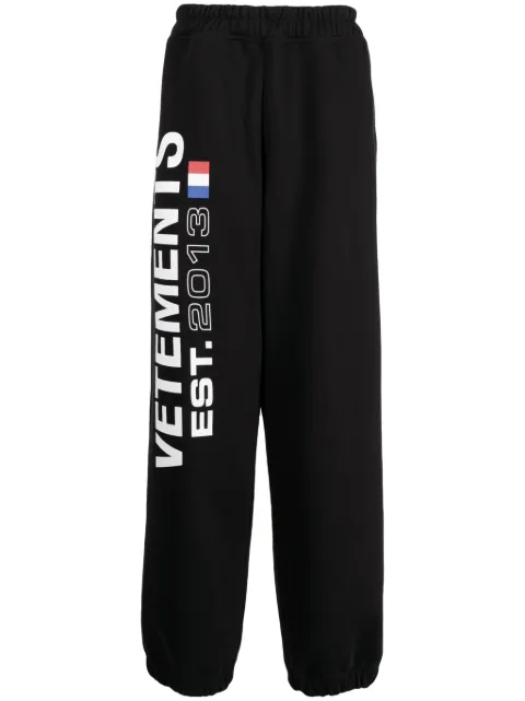 VETEMENTS Flag-logo print track pants Black UE54SP100B