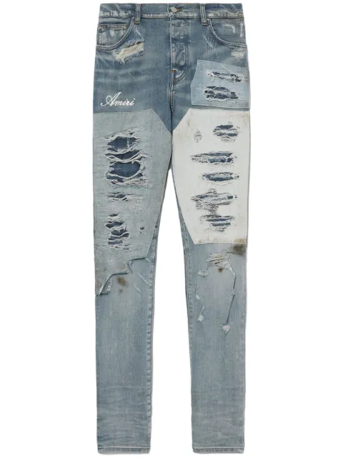 AMIRI logo-print distressed jeans Blue PF23MDS013