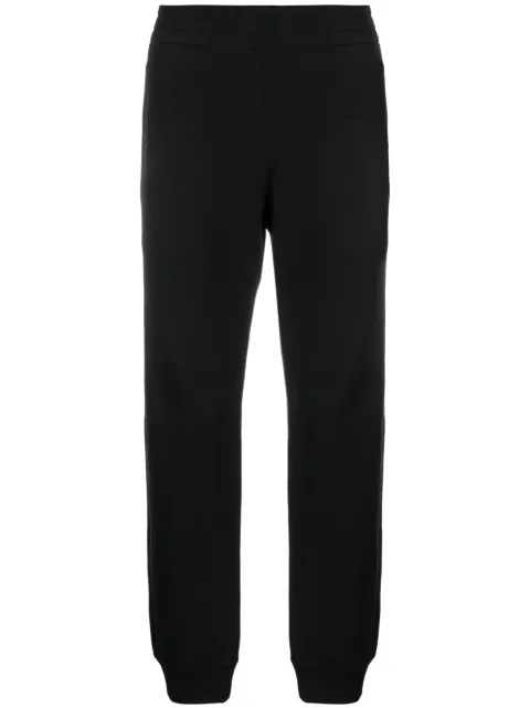 Moschino logo-patch elasticated track pants Black J03627028