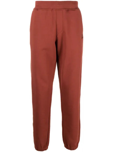 C.P. Company logo-embroidered cotton track pants Orange 14CMSP135A005086W