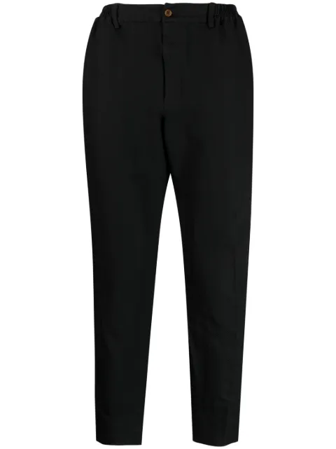 Black Comme Des Garçons chevron-pattern tapered trousers Black 1KP008052
