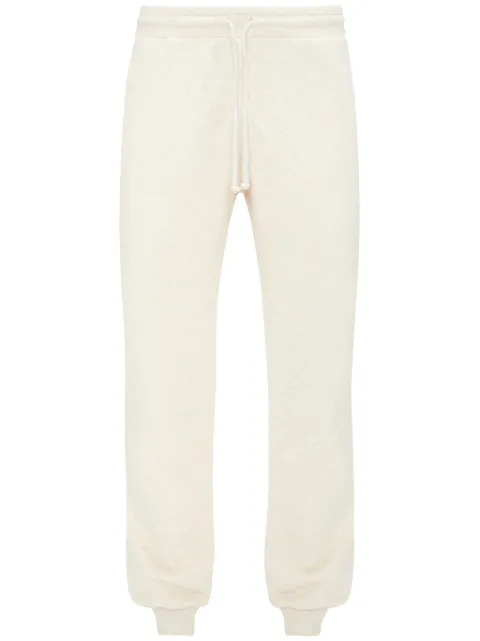 JW Anderson slogan-embroidered cotton track pants White JR0033PG1397161