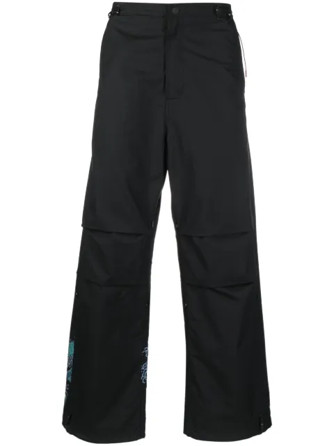 Maharishi graphic-print trousers Black 4244