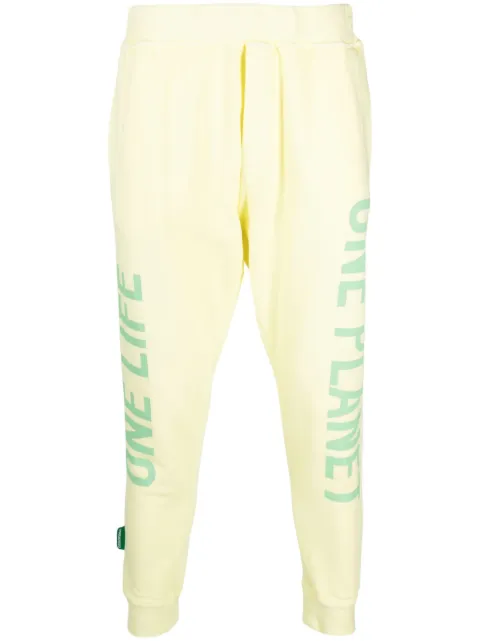 DSQUARED2 logo-print cotton track pants Yellow S78KB0056S25538