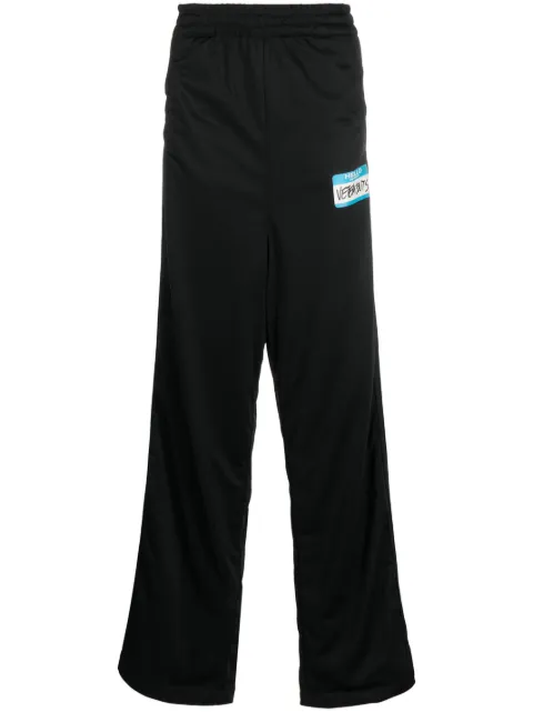 VETEMENTS logo-print wide-leg trousers Black UE63PA401B1308