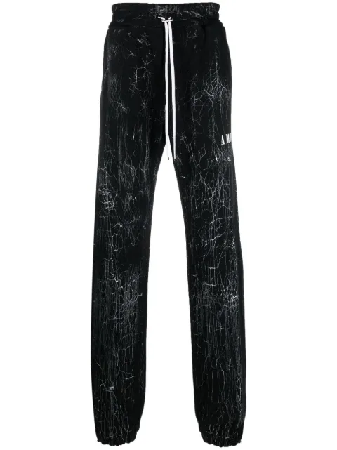 AMIRI cracked-dye logo track pants Black PS23MJL026